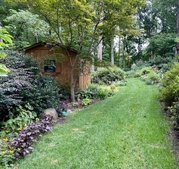 Border with potting shed