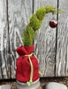 Potted plant; tip wired to curve to one side; for Christmas.