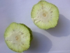 Cut open fruit with milky sap.