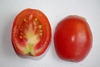 Longi-section of a cherry tomato showing seeds.