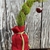 Potted plant; tip wired to curve to one side; for Christmas.