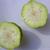 Cut open fruit with milky sap.