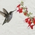 Spike of red, 2-lipped flowers visited by a hummingbird
