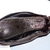 Close-up on a black leathery pod.